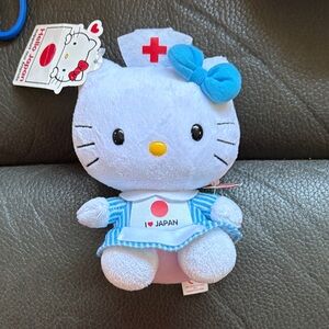 Hello kitty support our friends Red Cross stuffed kitty